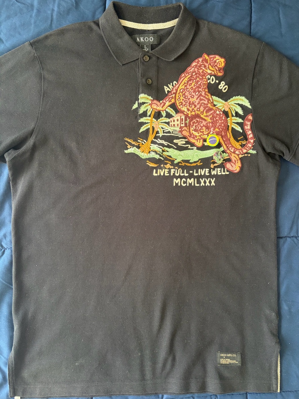 AKOO Black Polo with Embroidered Leopard & Tropical Motif